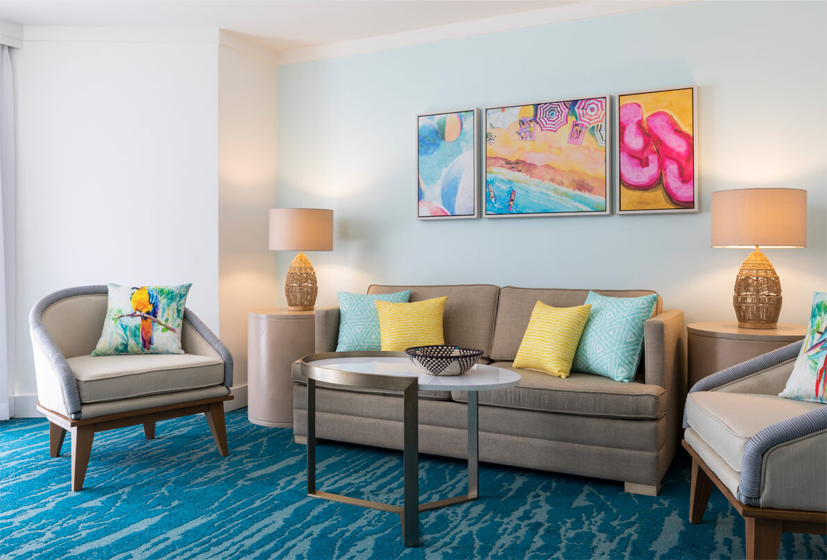 Yucca-Suite- a living room with a couch and a coffee table